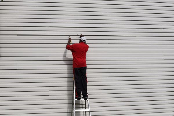 Loose Siding Repair in Lawrence