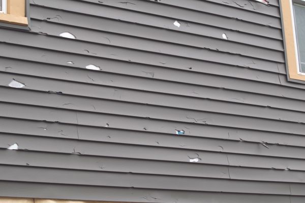 Damaged Siding Replacement in Lawrence