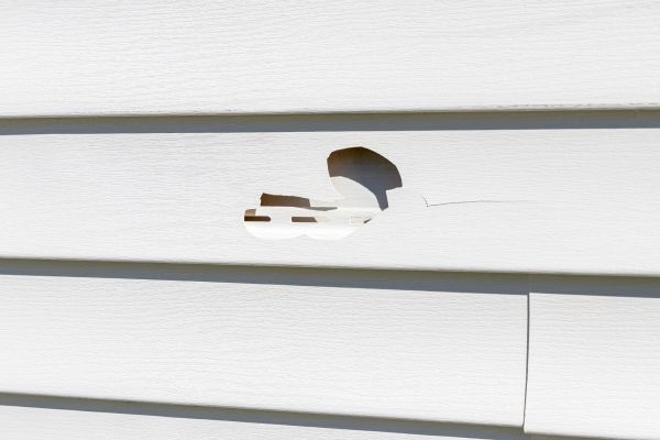 Cost of White Vinyl Siding Repair in Lawrence
